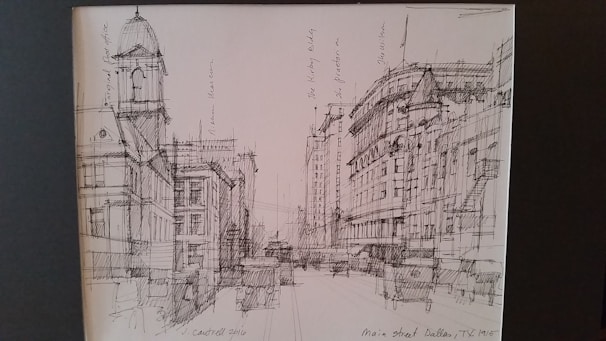 A detailed sketch of a bustling city street with dynamic lines and contrasting shadows.