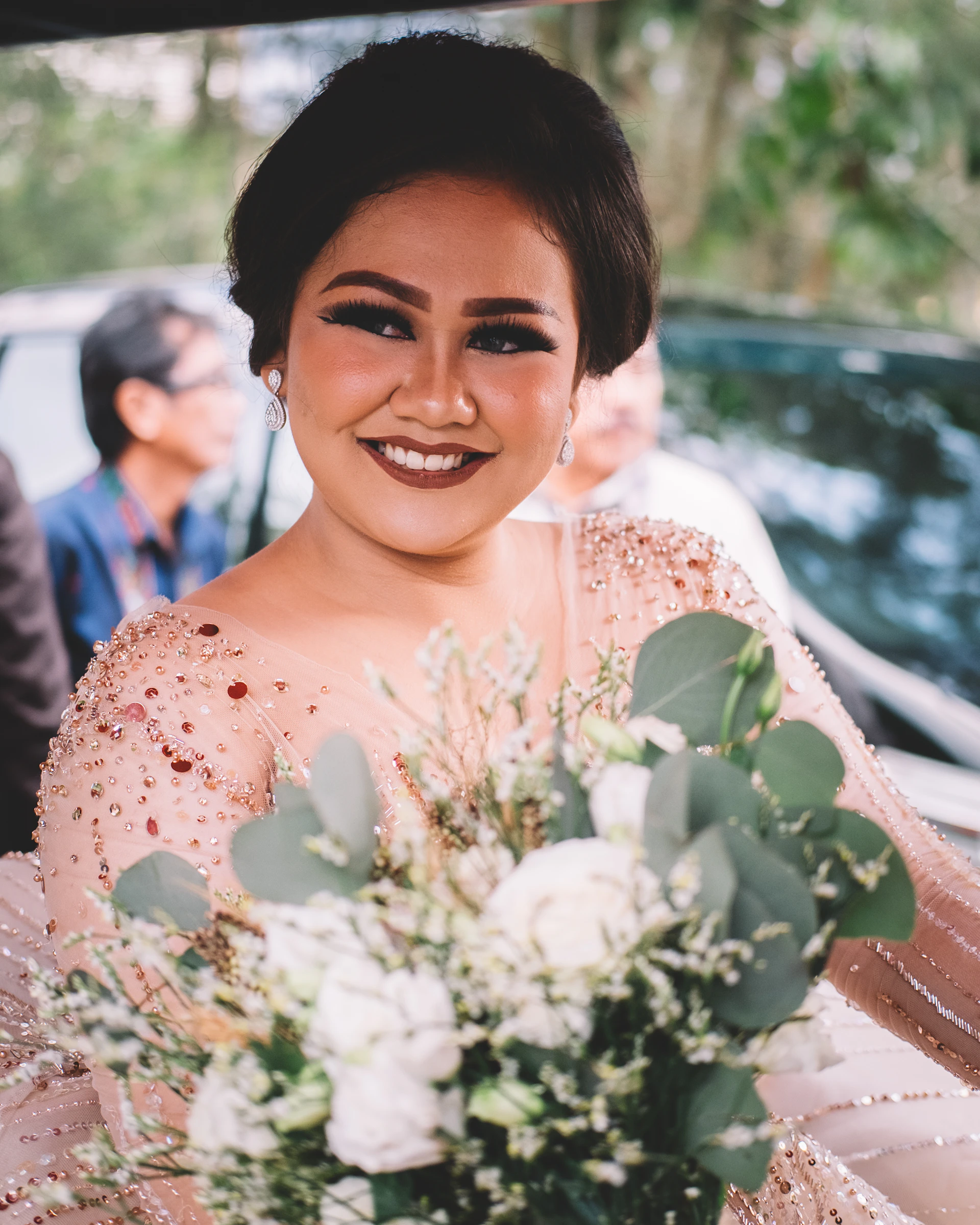 woman wearing yellow long-sleeved dress under white clouds and blue sky during daytime