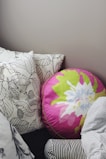 A collection of cotton throw pillows in various colors.