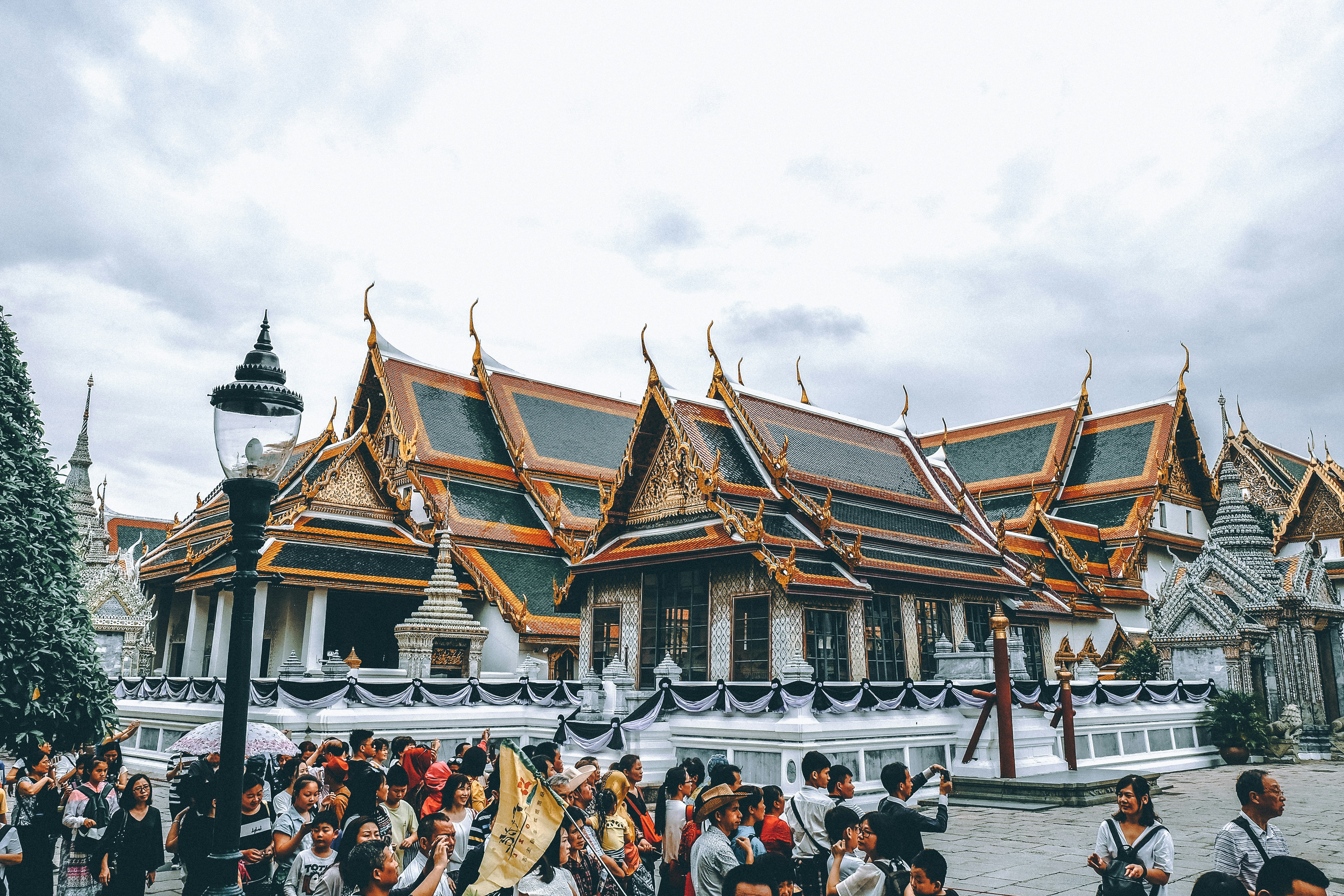 group of people neat temple, Grand Palace Bangkok