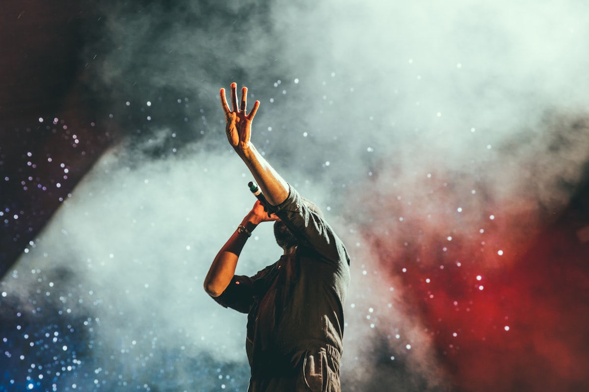 A performer singing on stage