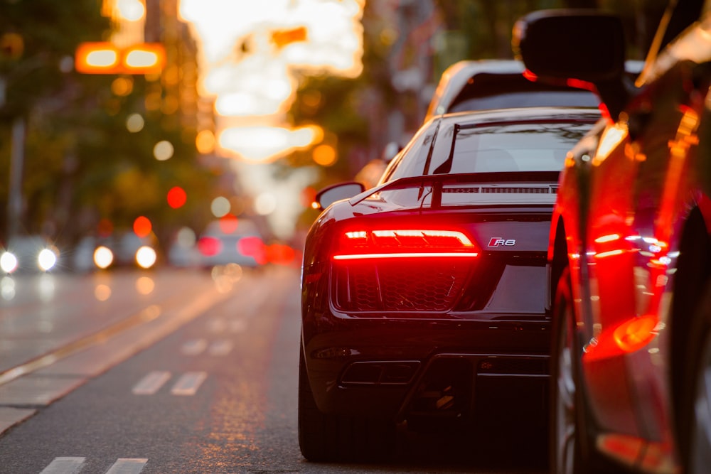 black Audi R8 parked beside road