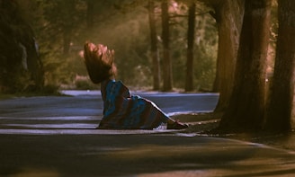woman beside tree