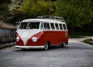 white and red Volkswagen van on road