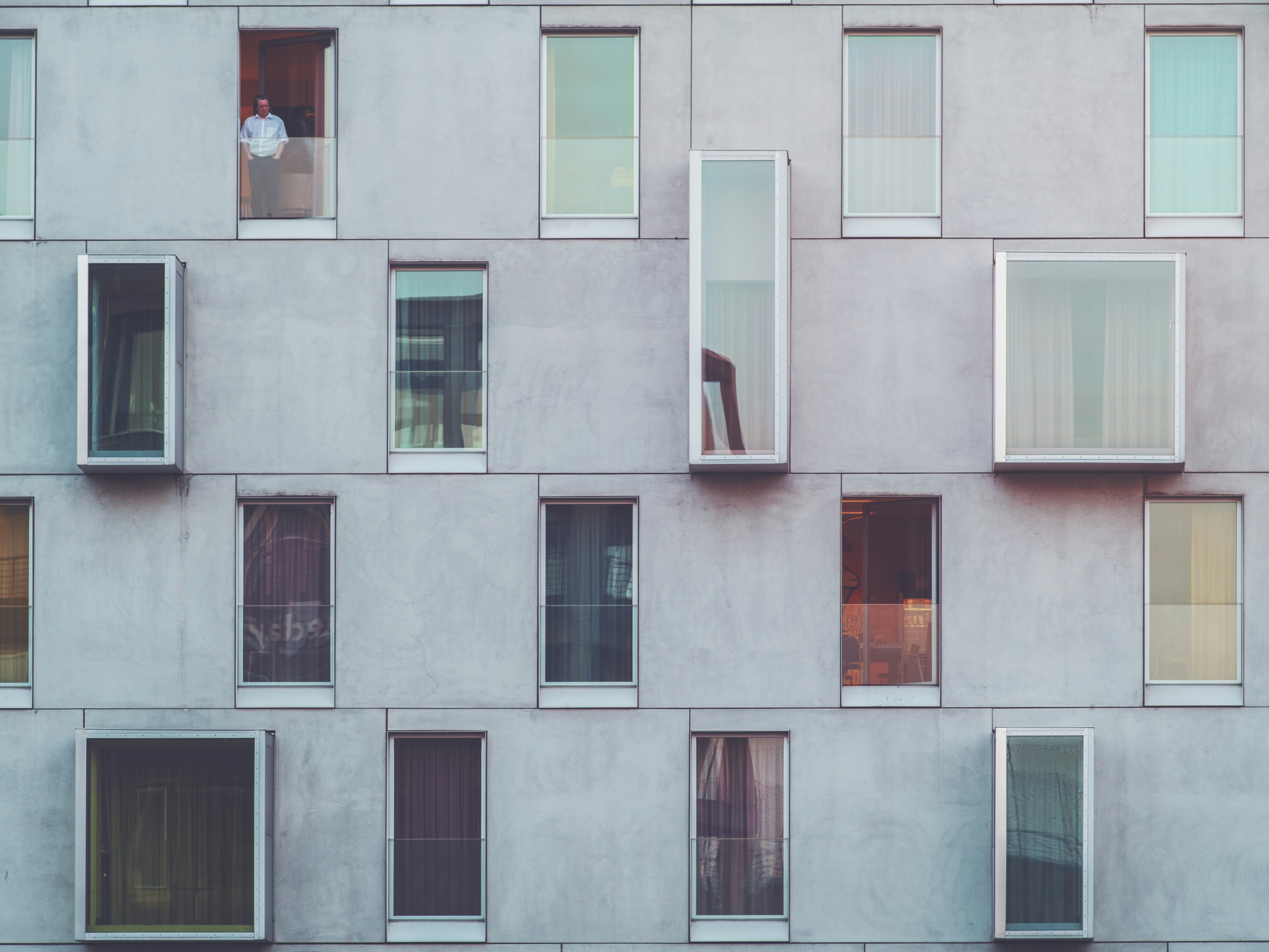 man standing on tenement door modern zoom background