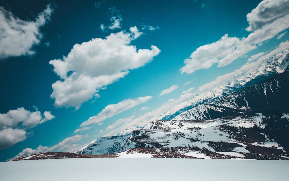 aerial photography of snow filled mountains