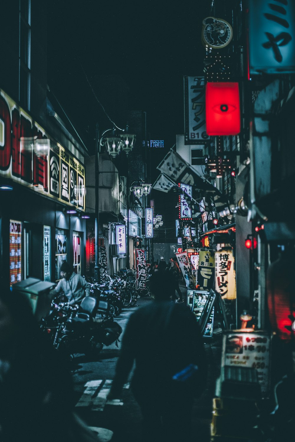 person standing between buildings