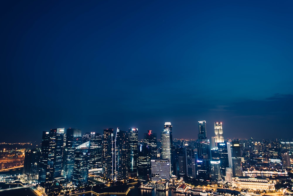 lighted city buildings during nighttime