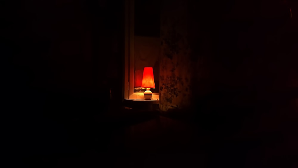 white and brown table lamp on top of surface