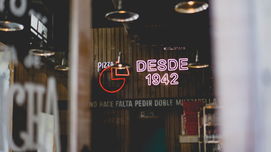 selective focus photo of desdes 1942 neon light signage