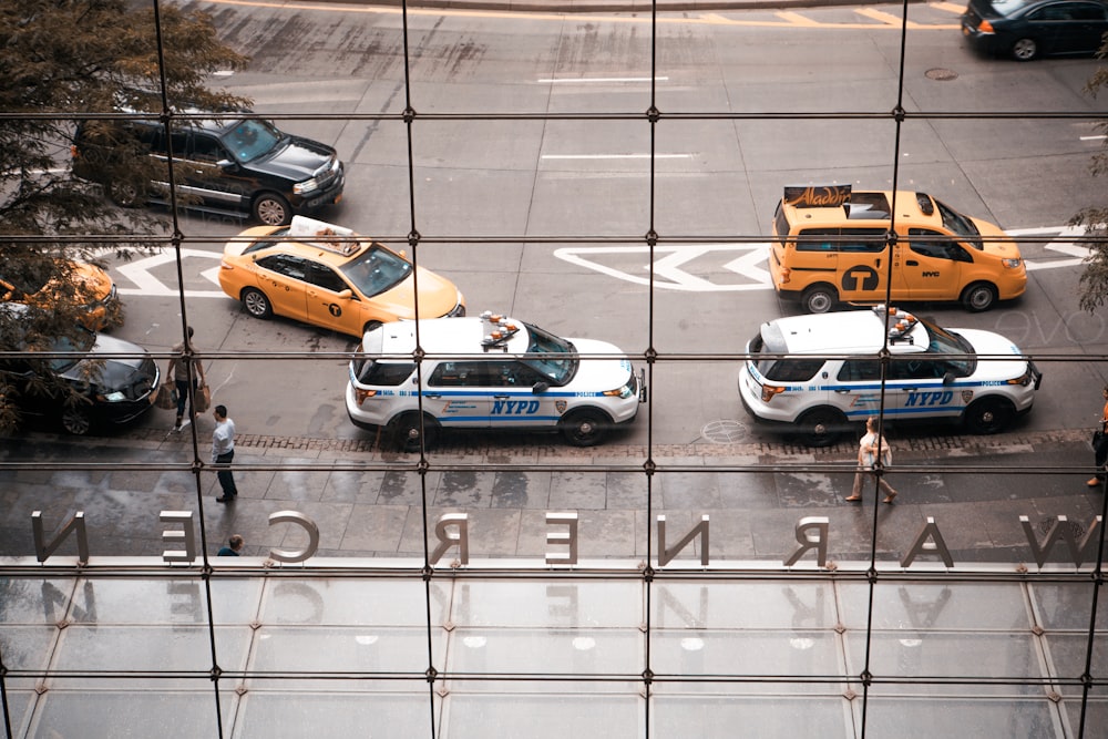 two parked NYPD vehicles