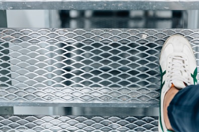 person walking on stair