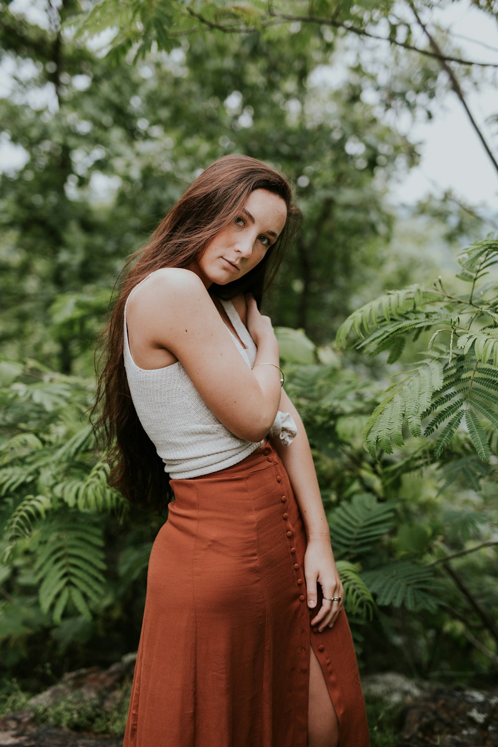 woman posing near leaf