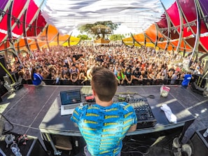 DJ on stage in front of audience