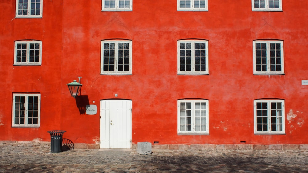 closeup photo of red concrete building