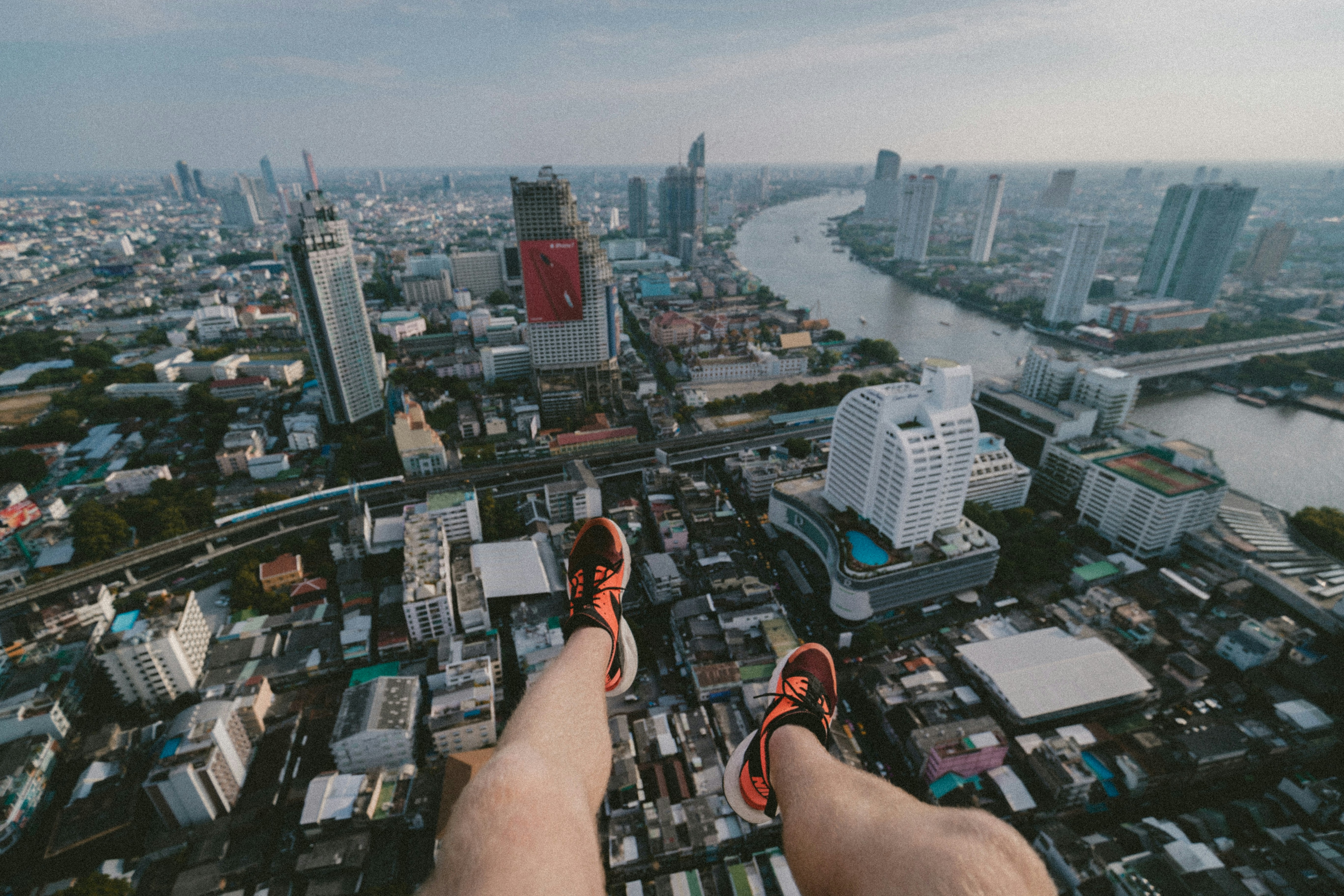 man paragliding taking aerial photography of city scapes during daytime, Hanging Out In Bangkok