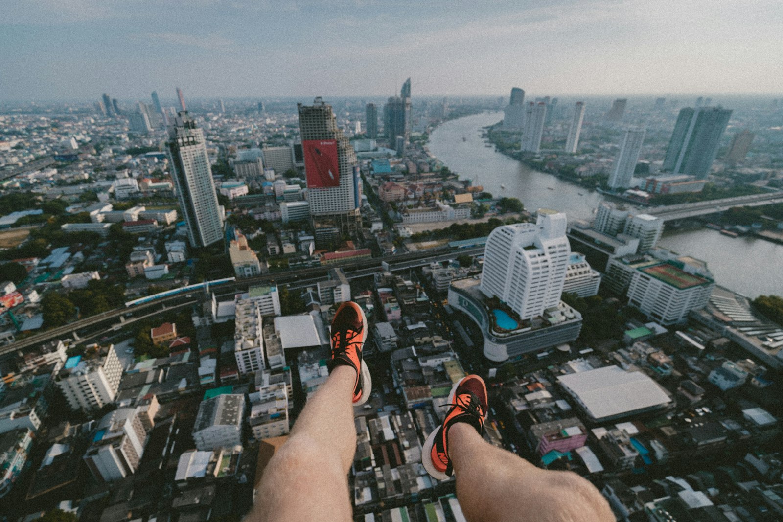 Canon EF 16-35mm F4L IS USM sample photo. Man paragliding taking aerial photography