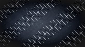 A drone view at night of parking lot lines