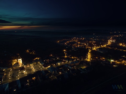 An aerial shot of a vibrant township development at sunset.