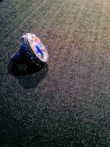 A bold ring with intricate hip-hop inspired designs shining bright