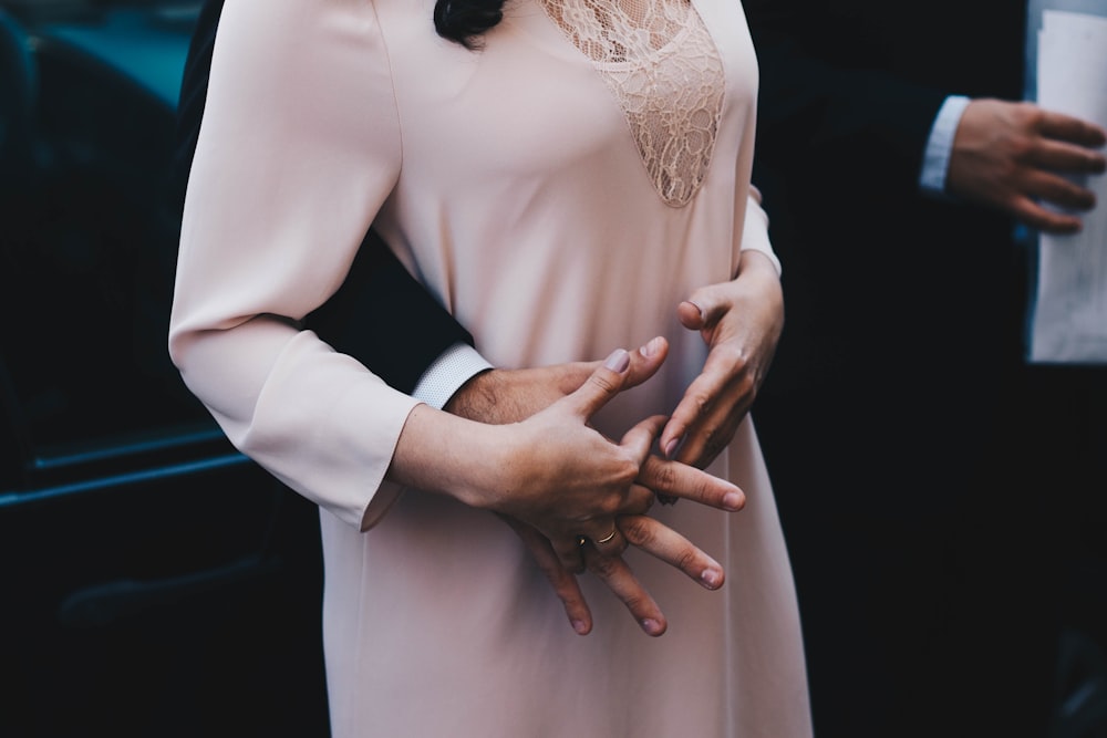 woman standing near car