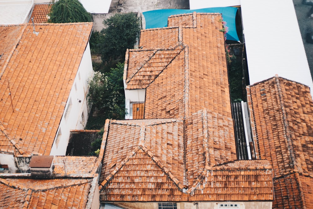 bird's eye view photography of brown roof shingles