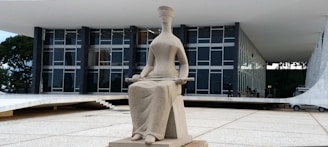 Finished 3D printed sculpture displayed in a bright, contemporary office lobby.