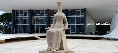 An elegant sculpture displayed in a modern setting.