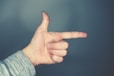 person's left hand indicating index-sub-list of top 10 tips on How to Get Lean Mass Body