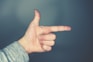 person's left hand indicating index-sub-list of top 10 tips on How to Get Lean Mass Body