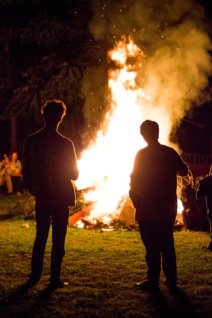 A warm gathering of diverse people sharing stories around a hearth, symbolizing hope and unity.