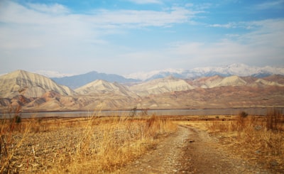 brown mountain under blue sky kyrgyzstan zoom background