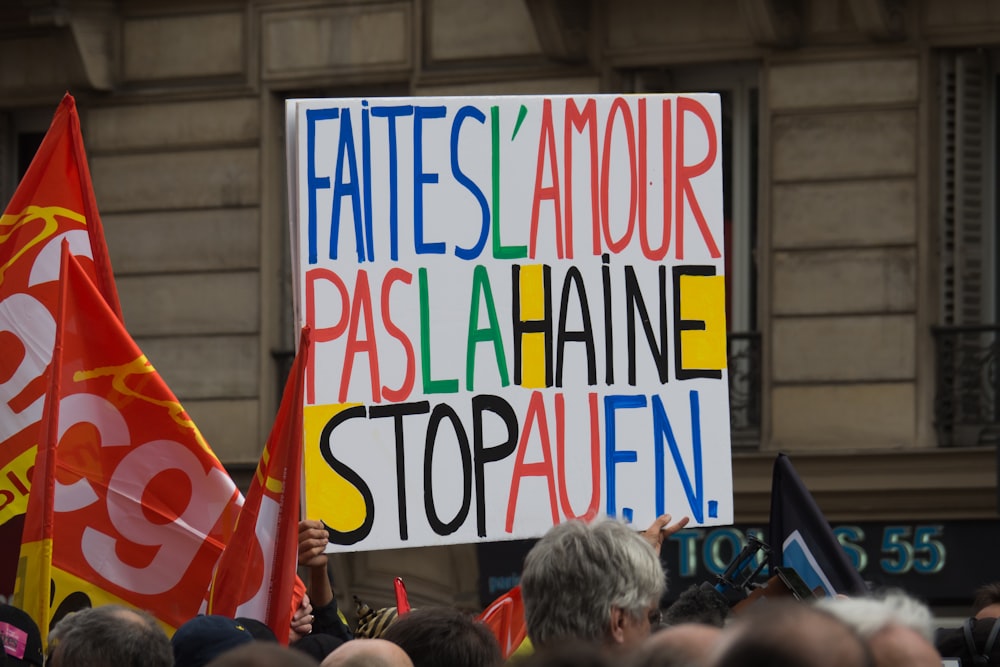 faitesl'amour paaslahaine stopaufn rally signage during daytime