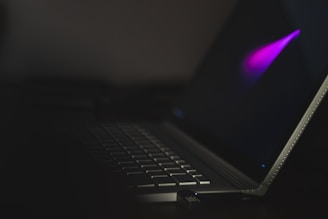 USB flash drive attached to laptop computer