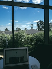 A serene office environment with cloud icons displayed on a computer screen.
