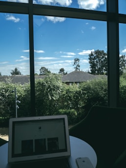 A serene office environment with cloud icons displayed on a computer screen.