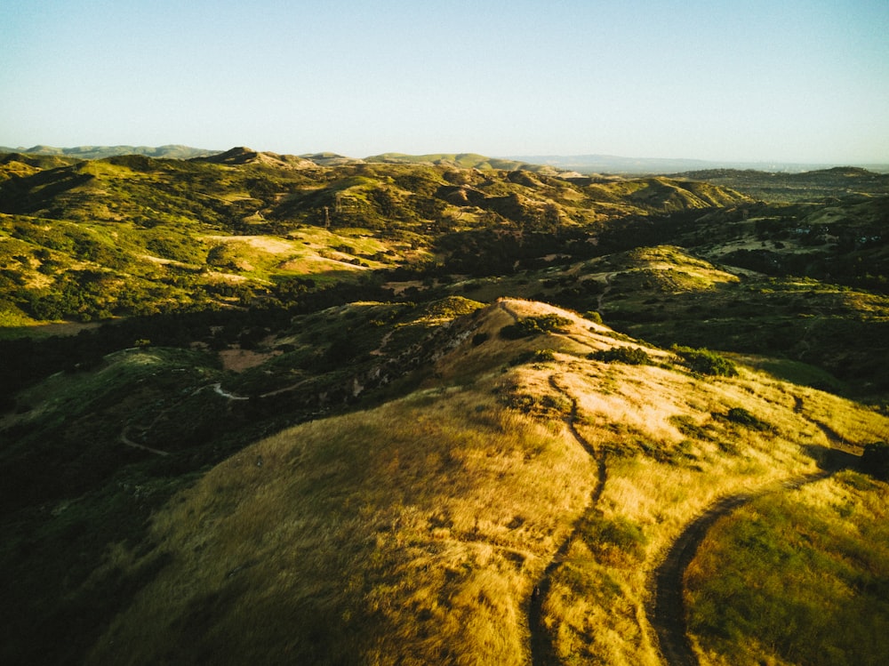 hills under clear blue sky