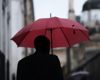 man holding umbrella