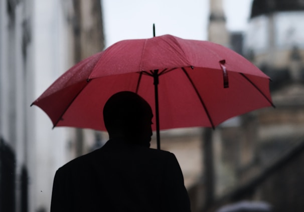 man holding umbrella