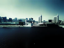 City skyline showcasing public infrastructure supported by private investment.