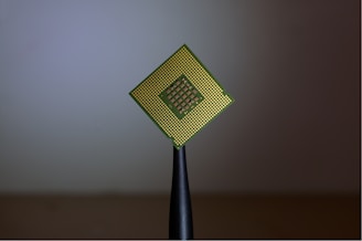 person holding computer cell processor