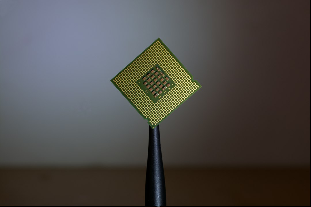 Person holding a computer processor chip