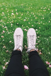 person laying on grass