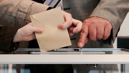 person standing near table