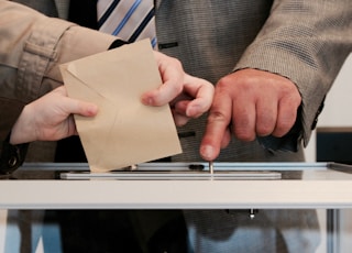 person standing near table