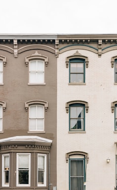 balance and symmetry for photo composition,how to photograph row houses in washington d.c.; two white and gray concrete buildings