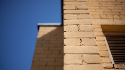 tilt photography of wall bricks