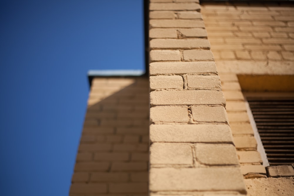tilt photography of wall bricks