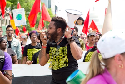 man holding megaphone civil right zoom background