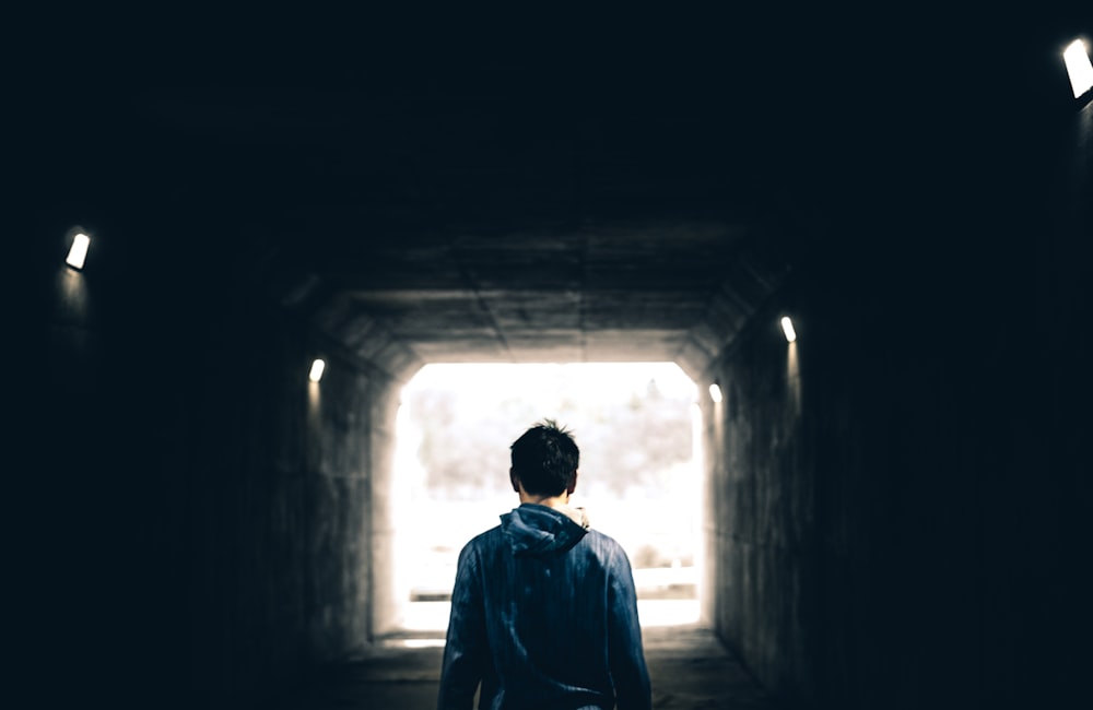 man standing in subway